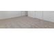 Empty bedroom showcasing neutral carpet flooring, white baseboards, and access to two closets at 9485 W Sandstone Mountain Dr, Casa Grande, AZ 85194