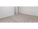 The bedroom features neutral carpet and white walls for a clean look at 9485 W Sandstone Mountain Dr, Casa Grande, AZ 85194