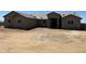 Newly built single Gathering home with a neutral color scheme and simple landscaping awaiting customization at 9485 W Sandstone Mountain Dr, Casa Grande, AZ 85194