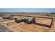 Newly built single-story home features a concrete driveway, sidewalk, and fenced yard at 9485 W Sandstone Mountain Dr, Casa Grande, AZ 85194