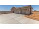 Attached two car garage with concrete drive, part of newly built home at 9485 W Sandstone Mountain Dr, Casa Grande, AZ 85194