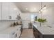 Updated kitchen featuring sleek countertops, stainless steel appliances, and ample cabinet space at 9485 W Sandstone Mountain Dr, Casa Grande, AZ 85194