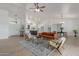 Spacious living room open to kitchen, with modern decor and ample natural light at 9485 W Sandstone Mountain Dr, Casa Grande, AZ 85194