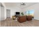Inviting living room with vaulted ceiling, comfortable seating, and a large window with views at 9485 W Sandstone Mountain Dr, Casa Grande, AZ 85194