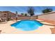 Refreshing backyard pool area with lounge chairs and a manicured landscape provides a serene outdoor oasis at 9566 E Plana Ave, Mesa, AZ 85212