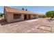 Backyard view highlighting the home's exterior, covered patio, and low-maintenance desert landscape at 9802 W Rockwood Dr, Peoria, AZ 85382