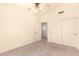 Bedroom with plush carpet, ceiling fan, closet, and neutral colored walls creating a cozy space at 9802 W Rockwood Dr, Peoria, AZ 85382