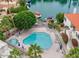 Stunning aerial view of a community pool, lake access and recreational area at 10080 E Mountainview Lake Dr # 327, Scottsdale, AZ 85258