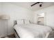A serene bedroom featuring a plush bed, soft lighting, and convenient closet access at 10080 E Mountainview Lake Dr # 327, Scottsdale, AZ 85258