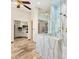Elegant bathroom featuring a marble shower, walk-in closet, and neutral paint at 11986 N 134Th Pl, Scottsdale, AZ 85259