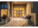 Inviting front entrance featuring desert landscaping, tiled walkway and cozy chairs at 11986 N 134Th Pl, Scottsdale, AZ 85259