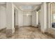 Unfurnished living room with tile floors, neutral walls, and chandelier at 11986 N 134Th Pl, Scottsdale, AZ 85259