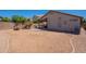 View of the spacious backyard and covered patio at 12208 N 41St Ln, Phoenix, AZ 85029