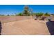 View of the spacious backyard with a barbecue grill at 12208 N 41St Ln, Phoenix, AZ 85029
