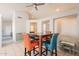 Eat in dining area featuring bright natural light, decorative wall cut-outs, and tiled flooring at 12208 N 41St Ln, Phoenix, AZ 85029