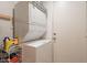 Laundry room featuring a stacked washer and dryer at 12208 N 41St Ln, Phoenix, AZ 85029