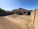Expansive backyard offers ample space for recreation and outdoor activities at 12934 W Voltaire Ave, El Mirage, AZ 85335