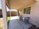 Relaxing covered patio with seating area perfect for enjoying the outdoors at 12934 W Voltaire Ave, El Mirage, AZ 85335