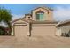 Charming home featuring a three-car garage and a beautifully tiled roof at 13993 N 102Nd St, Scottsdale, AZ 85260