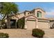 Charming home featuring a three-car garage and mature landscaping at 13993 N 102Nd St, Scottsdale, AZ 85260