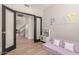 Bright playroom with playful decor, a kitchen set, and plush seating, perfect for imaginative play at 13993 N 102Nd St, Scottsdale, AZ 85260