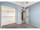 Bedroom showcasing a closet and bathroom access at 1407 W Utopia Rd, Phoenix, AZ 85027