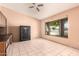 Office/Flex space with tile floor, desk and safe at 1407 W Utopia Rd, Phoenix, AZ 85027