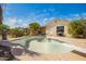 Backyard with an empty in-ground pool awaiting renovation and some landscaping for enjoyment at 1407 W Utopia Rd, Phoenix, AZ 85027