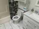 Well-maintained bathroom featuring a shower-tub combo, decorative shower curtain, and updated vanity at 14300 W Bell Rd # 57, Surprise, AZ 85374