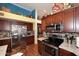 Kitchen features stainless appliances, granite countertops and tile backsplash at 14605 S 35 Pl, Phoenix, AZ 85044