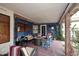 Covered patio offering a cozy seating area and inviting fire pit, perfect for relaxing outdoors at 14605 S 35 Pl, Phoenix, AZ 85044