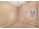 Well lit bedroom featuring neutral carpet and a bright window at 1523 E Tulsa St, Chandler, AZ 85225