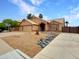 Charming single-story home with a two-car garage and landscaped front yard at 1523 E Tulsa St, Chandler, AZ 85225
