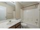 Standard bathroom with a shower-tub combo and a single-sink vanity at 15642 N Naegel Dr, Surprise, AZ 85374