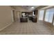 Spacious kitchen with granite countertops, an island, and stainless steel appliances at 15642 N Naegel Dr, Surprise, AZ 85374