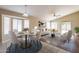 Open floor plan showcases living and dining areas, perfect for entertaining guests or relaxing with Gathering at 15642 N Naegel Dr, Surprise, AZ 85374