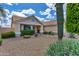 Attractive single-story home with desert landscaping, a tiled roof, and well-maintained exterior at 16230 E Glenpoint Dr, Fountain Hills, AZ 85268