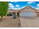 Charming single-story home with a well-maintained desert landscaped front yard and a two-car garage at 16230 E Glenpoint Dr, Fountain Hills, AZ 85268