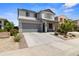 Charming two-story home with a well-maintained yard and a two-car garage at 16956 W Alice Ave, Waddell, AZ 85355