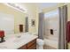 Bathroom featuring a single sink vanity, medicine cabinet, and shower-tub combination at 17192 W Hermosa Dr, Surprise, AZ 85387