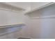 Walk-in closet with built-in shelving for ample storage space at 18250 N 32Nd St # 1019, Phoenix, AZ 85032