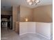 Bright hallway with tile flooring and seamless access to the kitchen with stainless appliances at 18250 N 32Nd St, Phoenix, AZ 85032