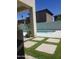 A refreshing pool with a lovely deck surrounded by green grass is perfect for summertime fun at 18563 W Fairway Dr, Surprise, AZ 85374