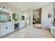 Open concept bathroom features a double vanity and glass enclosed shower in the background at 1890 E Sagittarius Pl, Chandler, AZ 85249