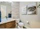 Modern half bathroom features stylish tile work, contemporary fixtures, and elegant design at 1890 E Sagittarius Pl, Chandler, AZ 85249