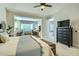 Spacious bedroom with an ensuite bathroom and connecting office space for added convenience at 1890 E Sagittarius Pl, Chandler, AZ 85249