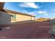 Expansive backyard featuring low-maintenance desert landscaping and ample space for outdoor activities at 19873 W San Juan Ave, Litchfield Park, AZ 85340