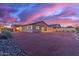Spacious backyard with low-maintenance desert landscaping and block wall fencing for privacy at 19873 W San Juan Ave, Litchfield Park, AZ 85340