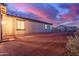 Back of house showcases desert landscaping and ample room for outdoor activities and potential customization at 19873 W San Juan Ave, Litchfield Park, AZ 85340