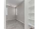 Bedroom with plush carpeting, neutral paint and an adjacent closet area at 19873 W San Juan Ave, Litchfield Park, AZ 85340
